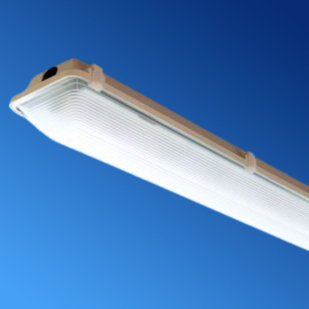 A white light fixture against a blue sky