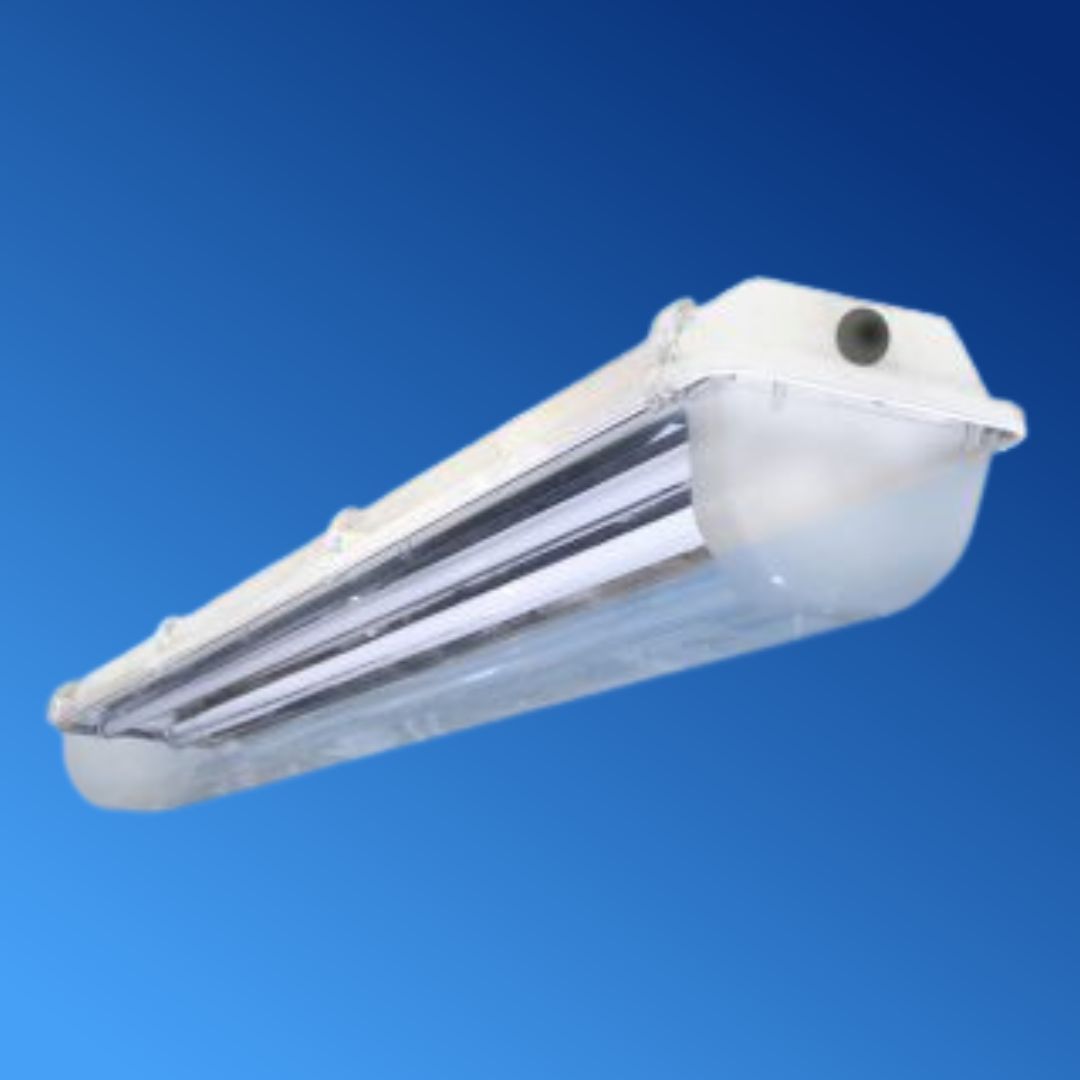 A white light fixture against a blue sky