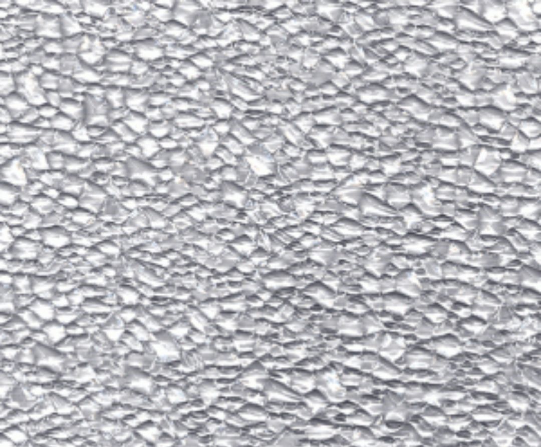 A close up of a shiny silver surface with a rough texture.