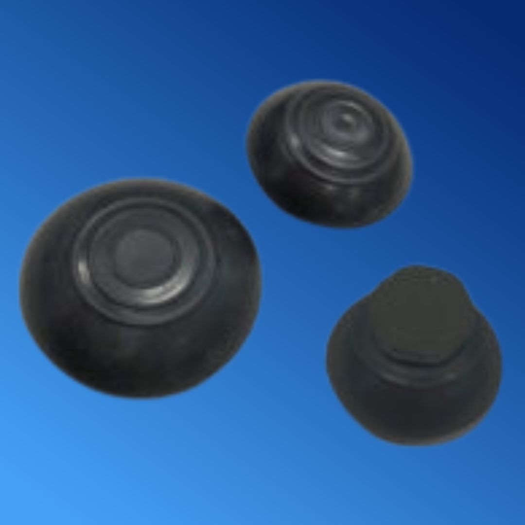 Three black rubber balls on a blue background