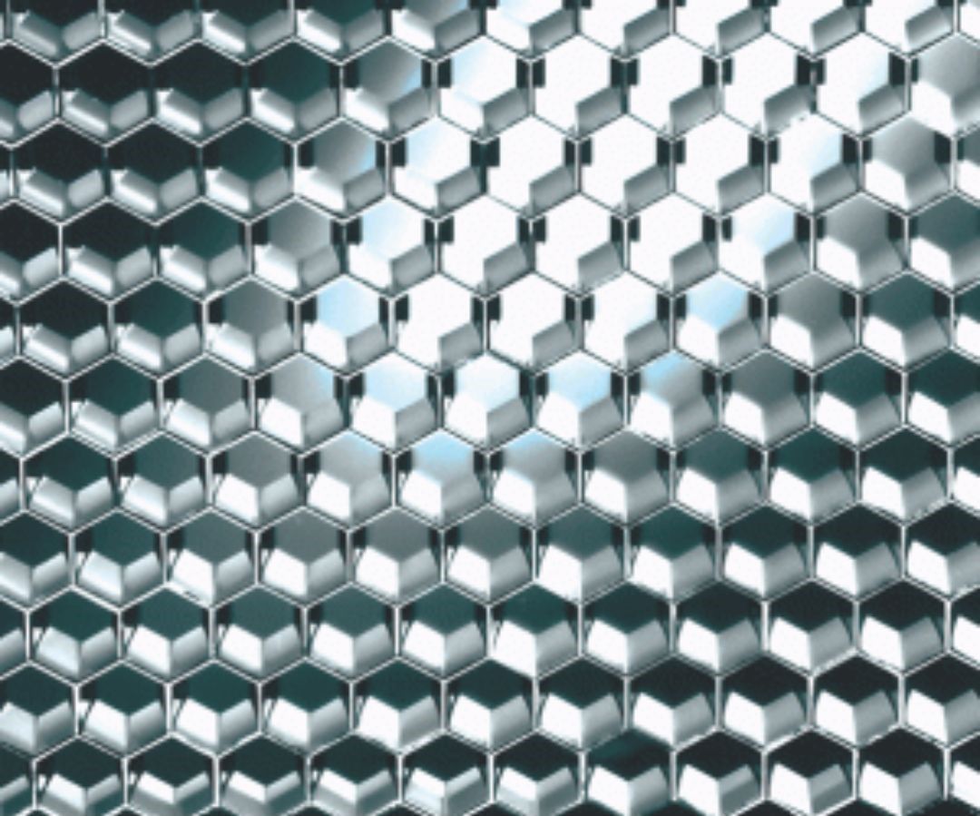 A close up of a metal honeycomb pattern