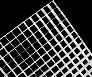 A close up of a white grid on a black background.