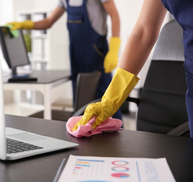 Performance Chores team disinfecting office desks in Lincoln, NE