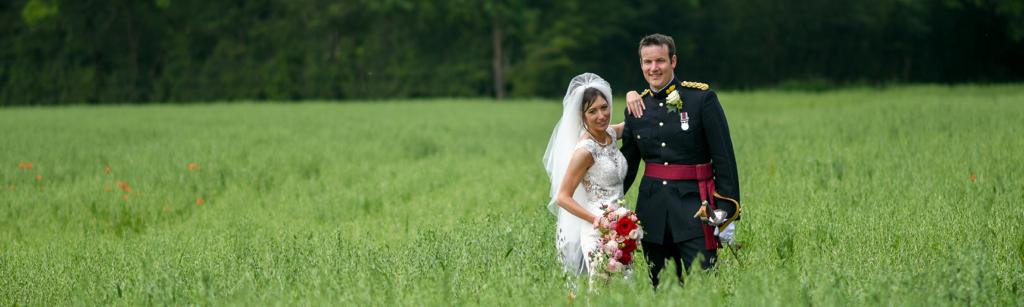 wedding couple with grass background