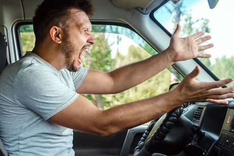 man screaming while driving