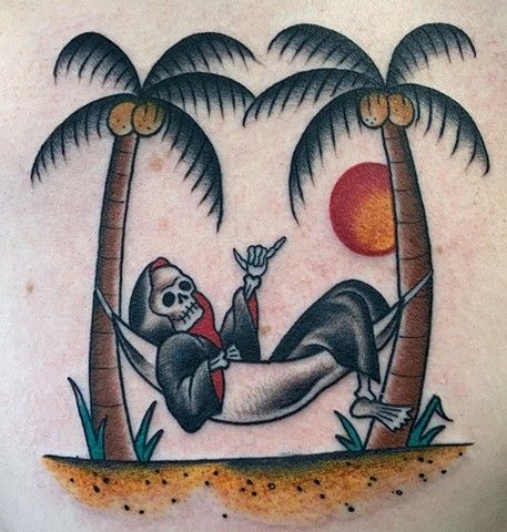 A grim reaper is laying in a hammock between two palm trees.