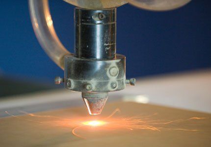 Laser in Action — Plymouth, MN — Crown Plastics Inc