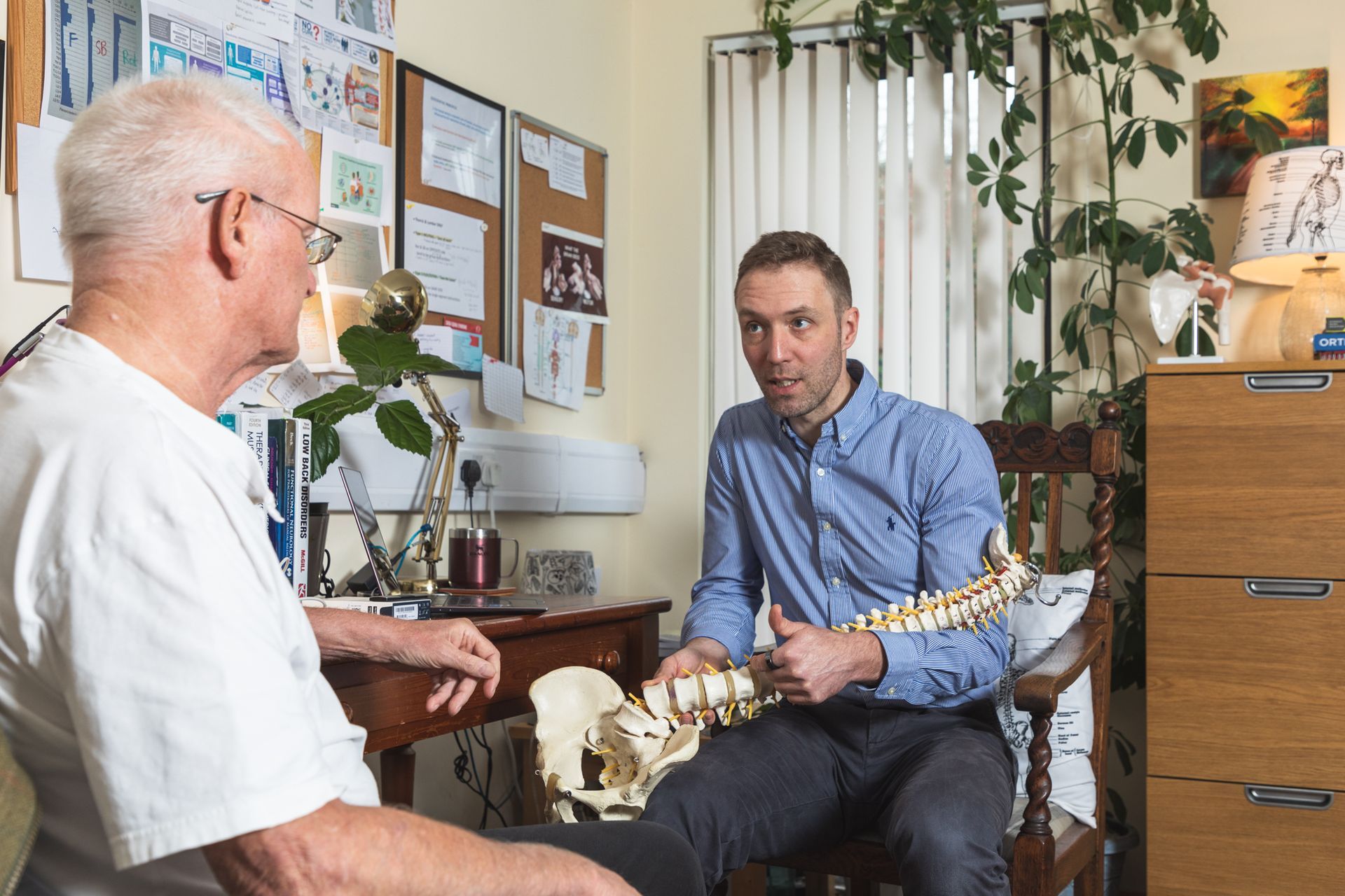 Paul Martin during a consultation with a patient.