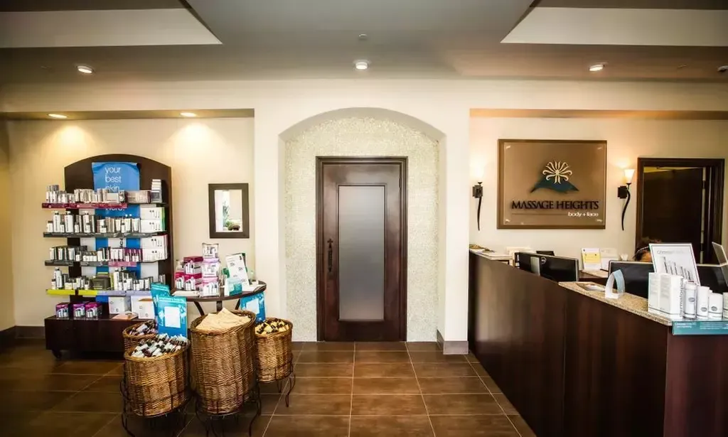 Massage Heights reception area with skincare products and front desk