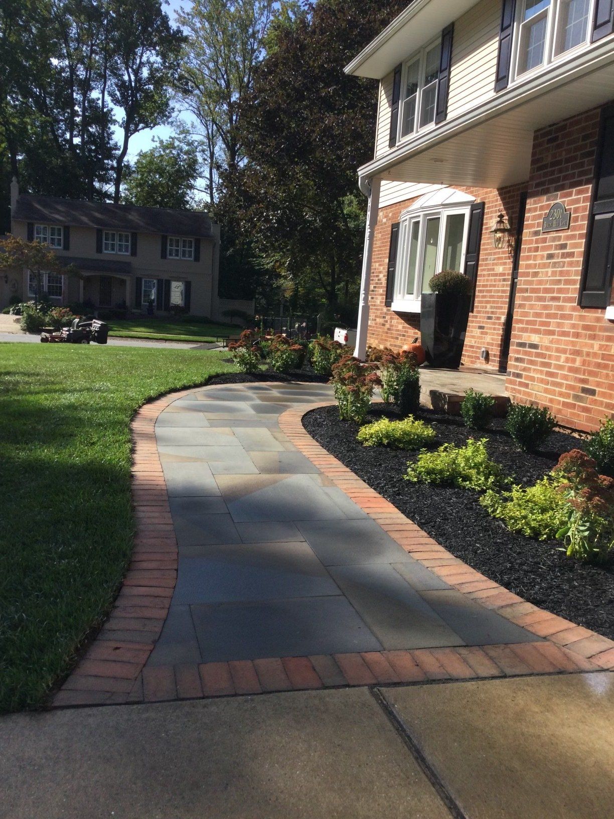 House Entrance With Stone Pathway — New Castle, DE — Ayala Landscaping