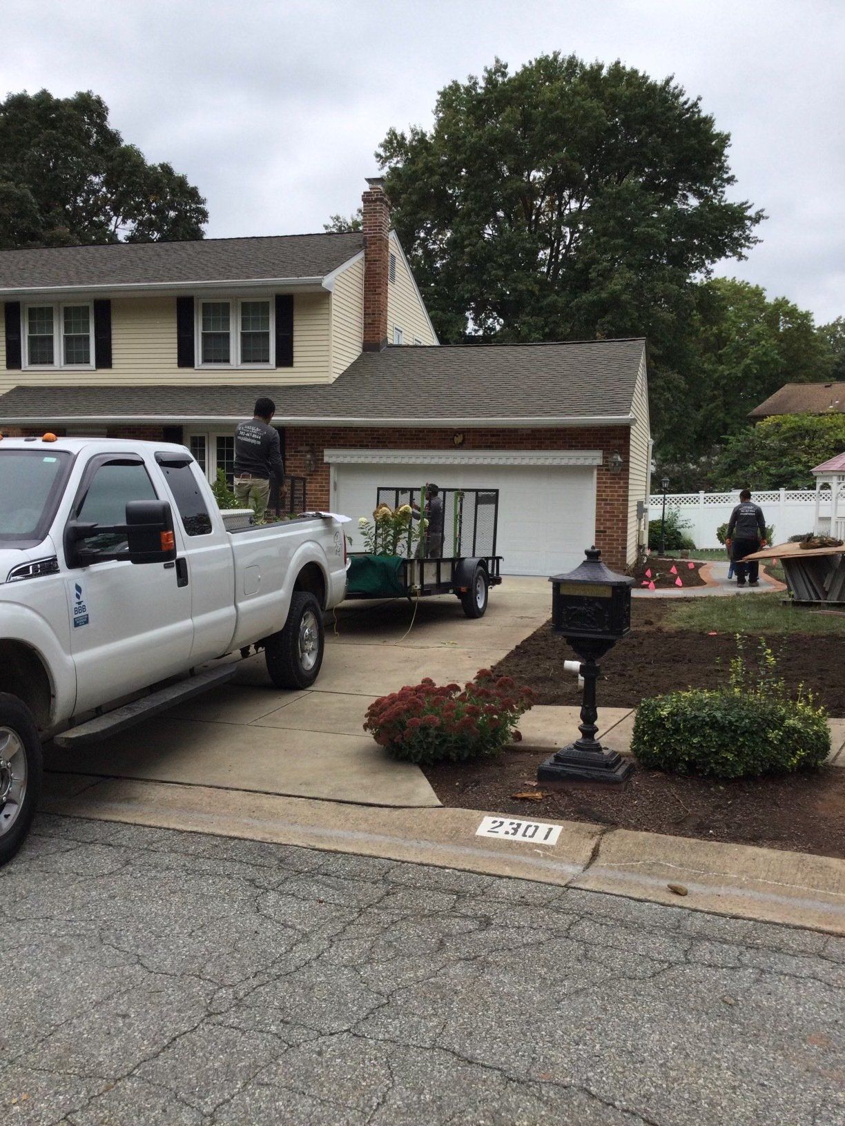 Designed Landscape Beside Garage — New Castle, DE — Ayala Landscaping