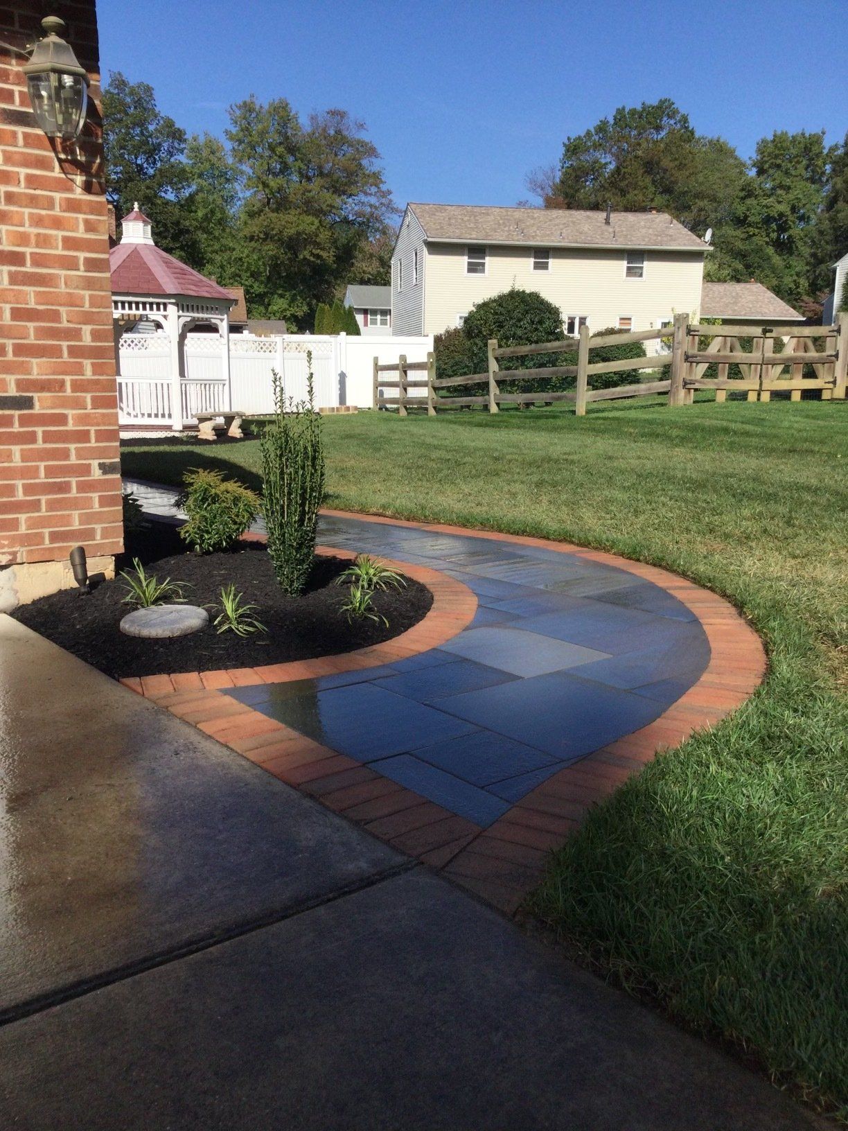 Backyard With Wood Fence — New Castle, DE — Ayala Landscaping
