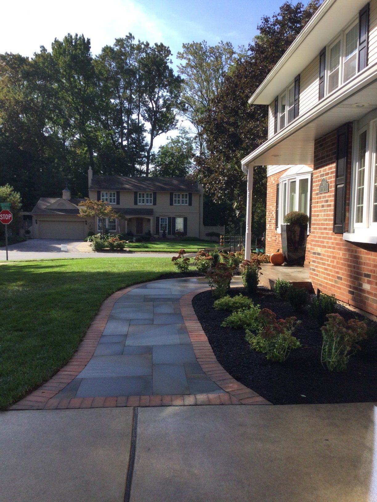 Patios Made With Flagstone & Clay Brick — New Castle, DE — Ayala Landscaping