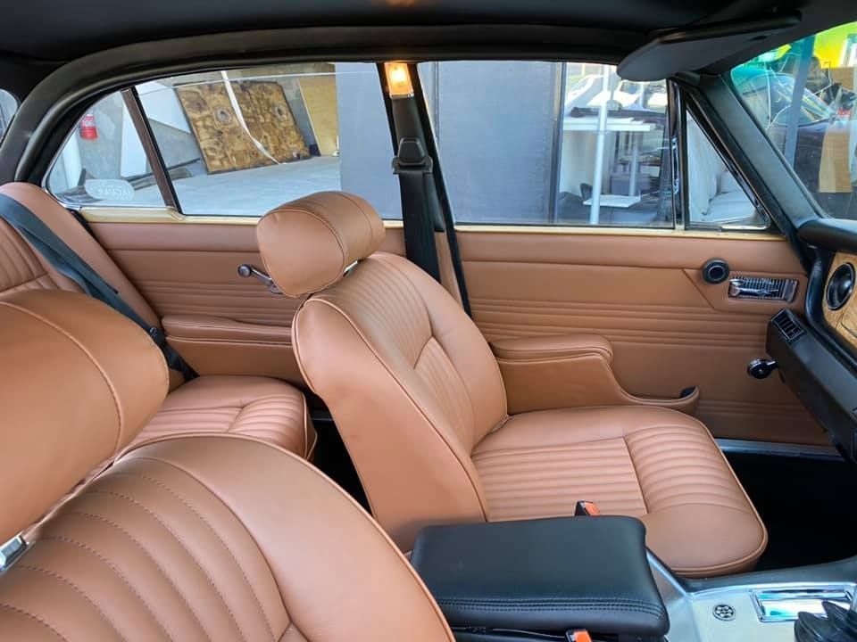 The Interior of a Car With Brown Leather Seats — Currumbin Trimmers  In Currumbin Waters, QLD