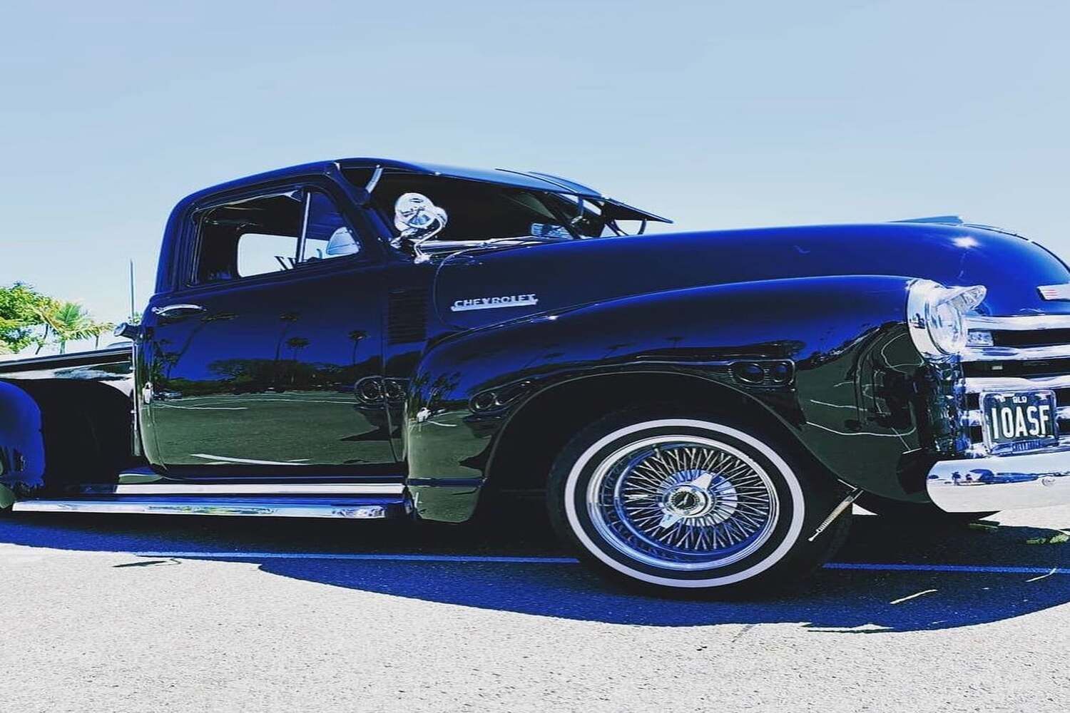 A Blue Truck Is Parked On The Side Of The Road — Currumbin Trimmers  In Currumbin Waters, QLD