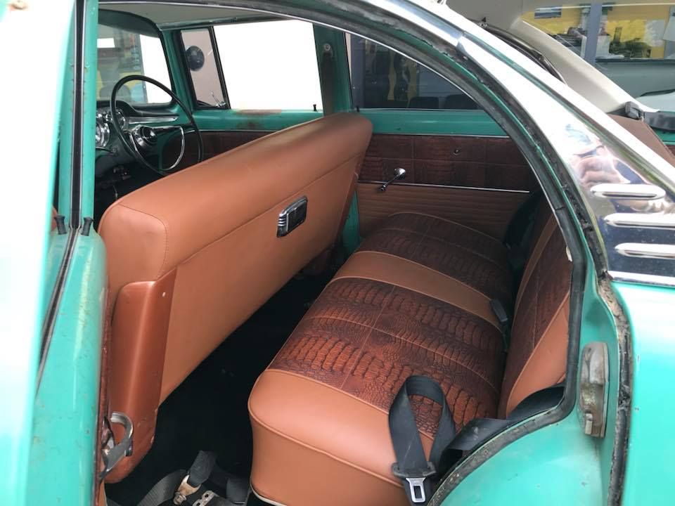The Inside of a Green Car With Brown Seats — Currumbin Trimmers In Kingscliff, NSW
