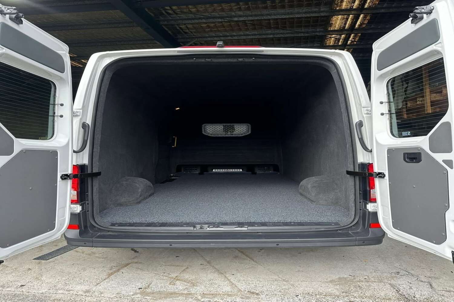 The Back Of A White Van With Its Doors Open — Currumbin Trimmers  In Currumbin Waters, QLD