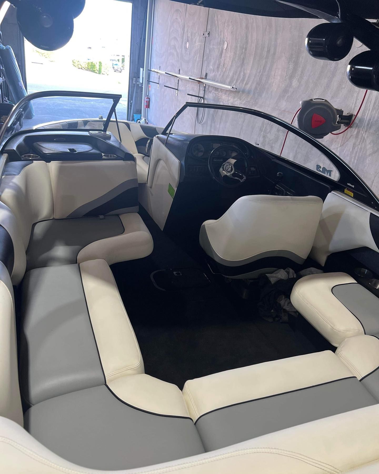 The Inside of a Boat With Gray and White Seats — Currumbin Trimmers In Byron Bay, NSW