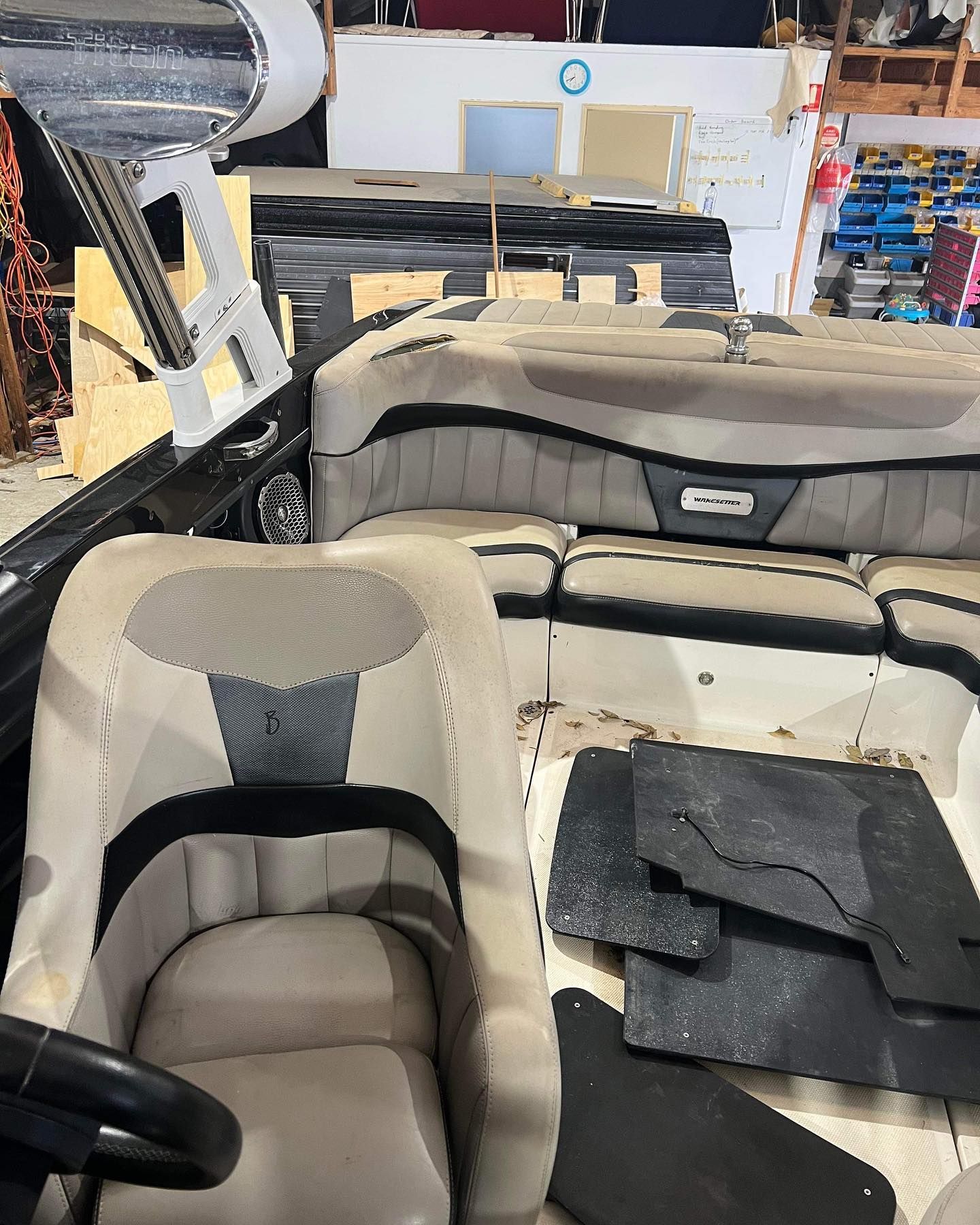 The Inside of a Boat With a Steering Wheel and Seats — Currumbin Trimmers In Tweed Heads, NSW