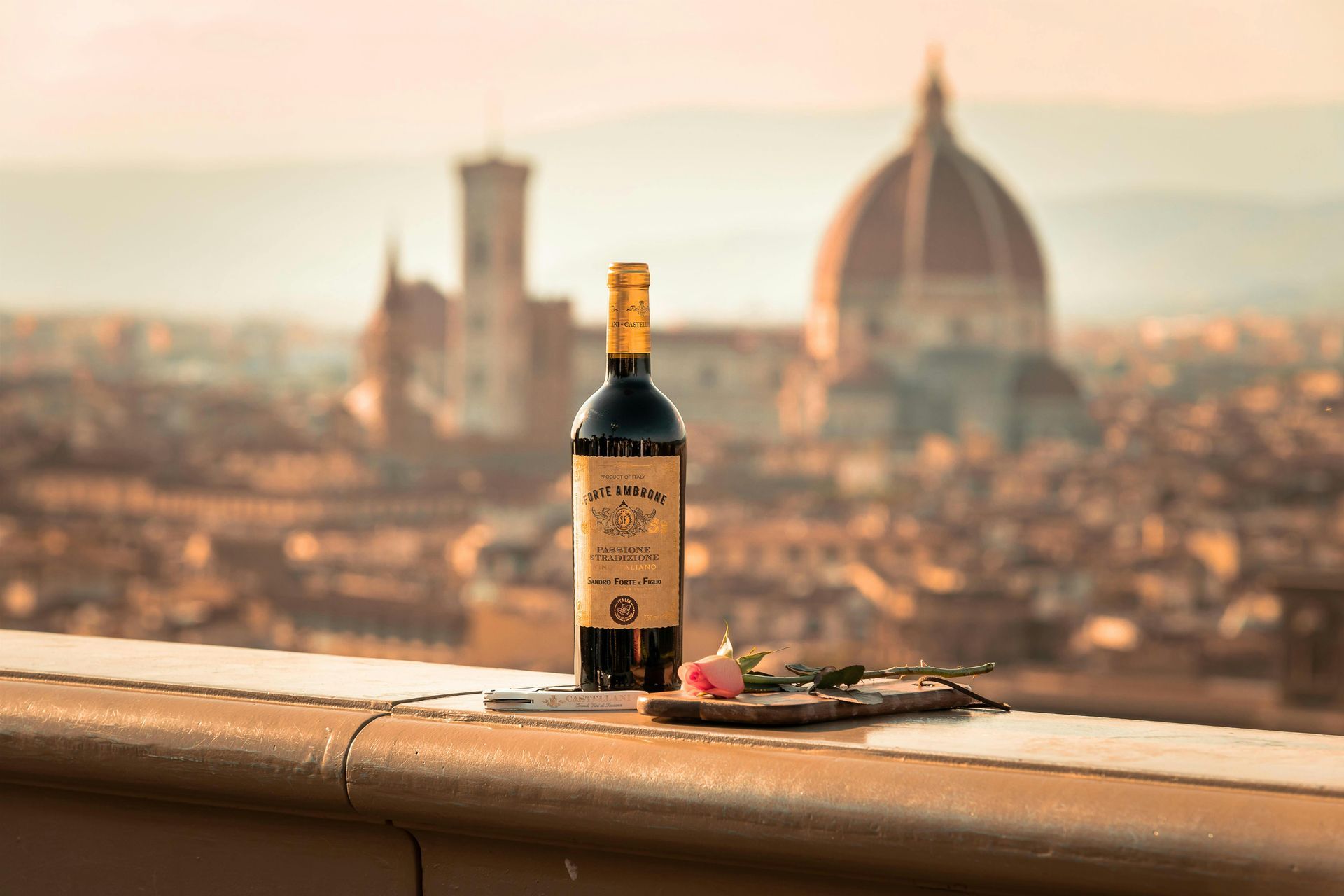 Bottle of wine with Florence cityscape in background.
