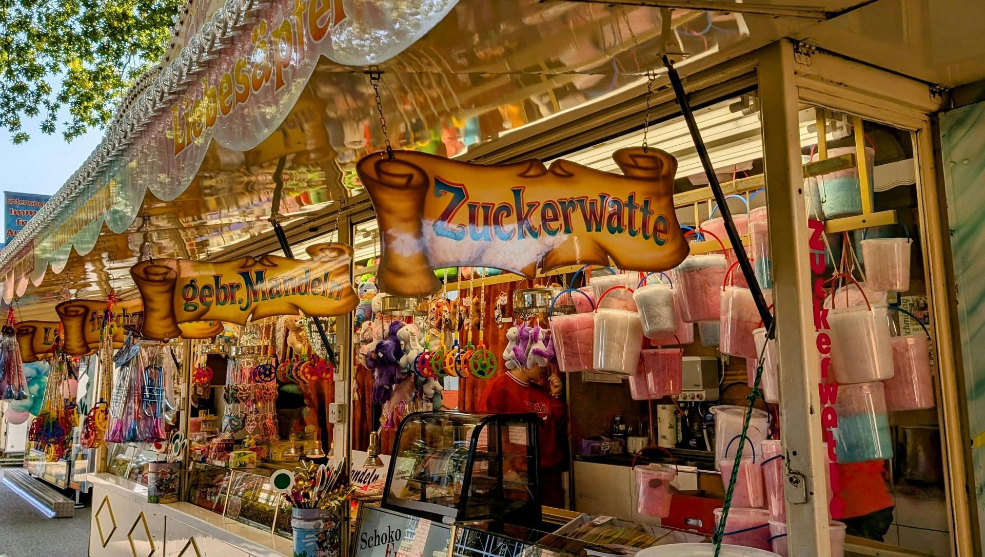 A candy stand with a sign that says zuckerwatte