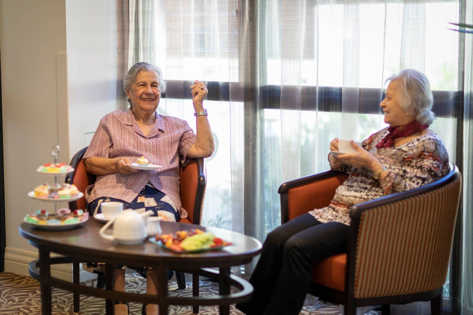 aged care residence having a cup of tea