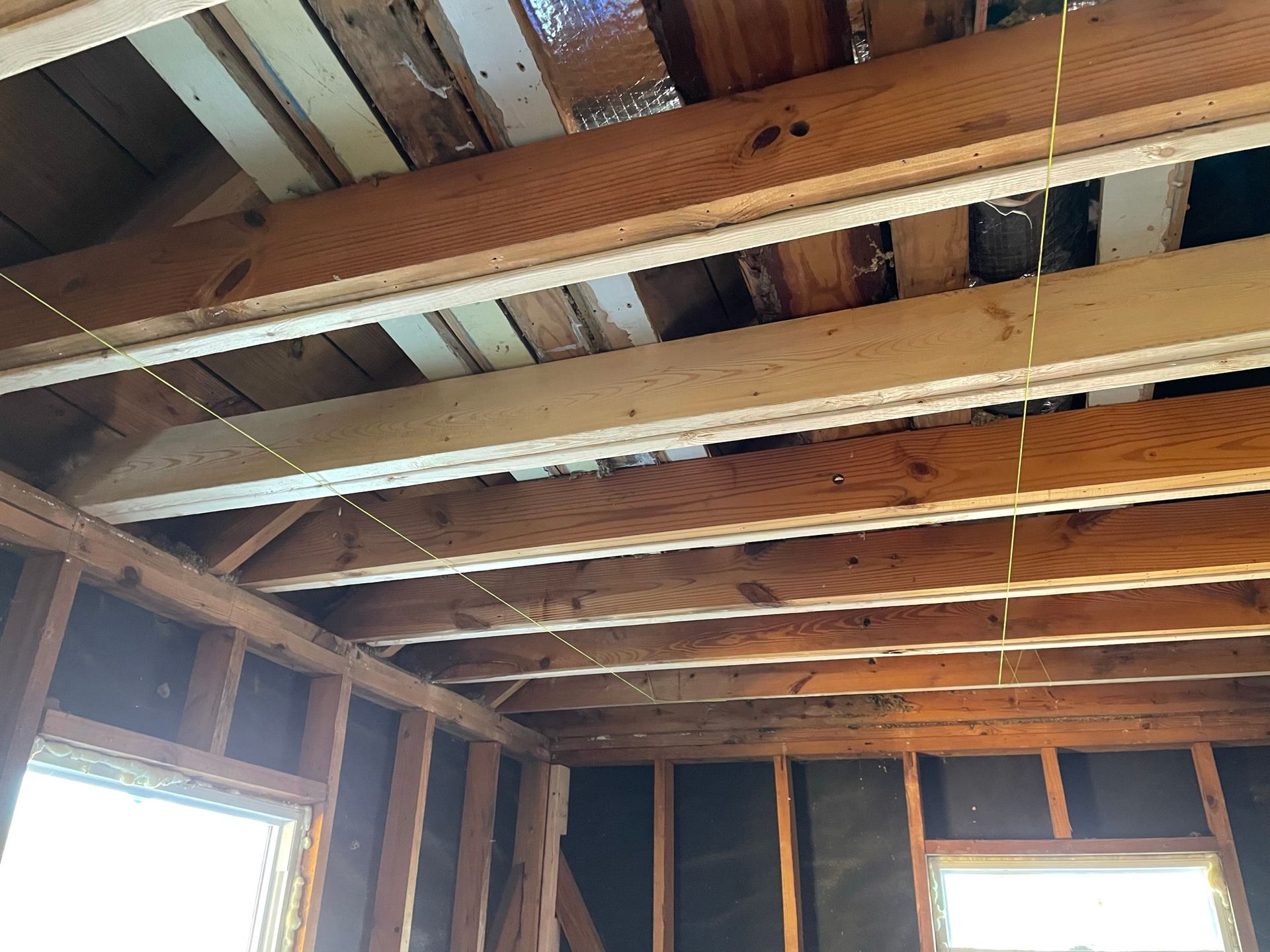A picture of the ceiling of a house under construction.
