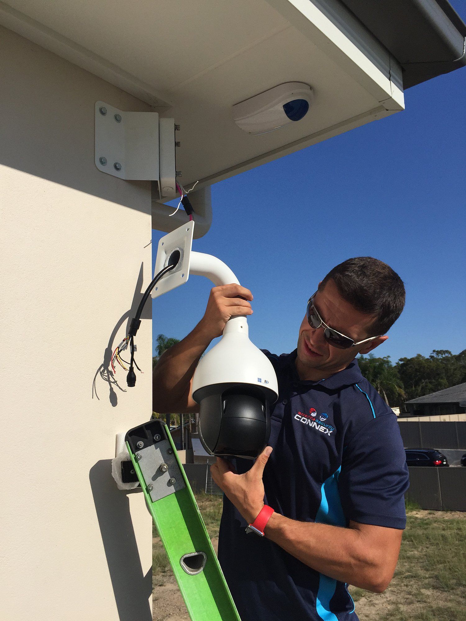 Worker Installing a CCTV — Greater Sydney, NSW — Connex Antenna & Security