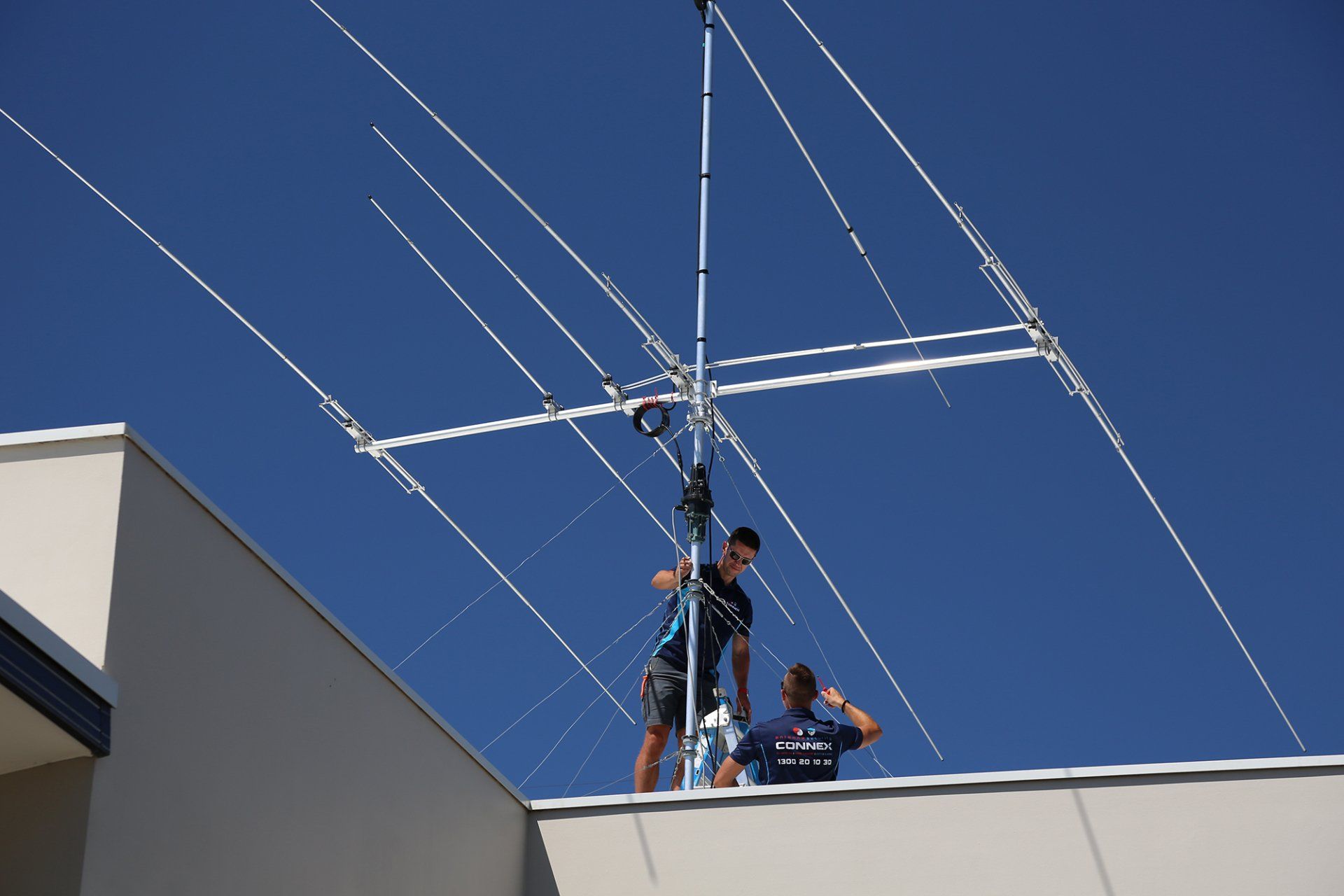 Two Men Working on the Antenna — Greater Sydney, NSW — Connex Antenna & Security