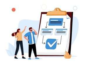 Man and woman looking at a flowchart on a large clipboard with checkmark.