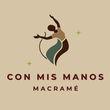A logo for a company called con mis manos macrame
