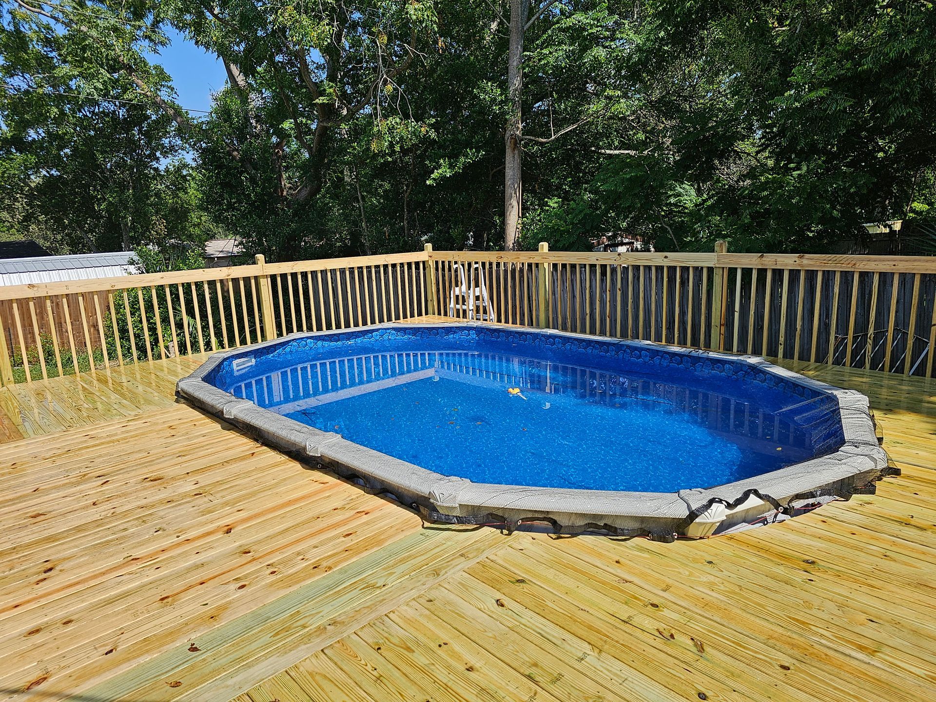 An above ground pool installation in Homosassa FL by Michael Beach Fence