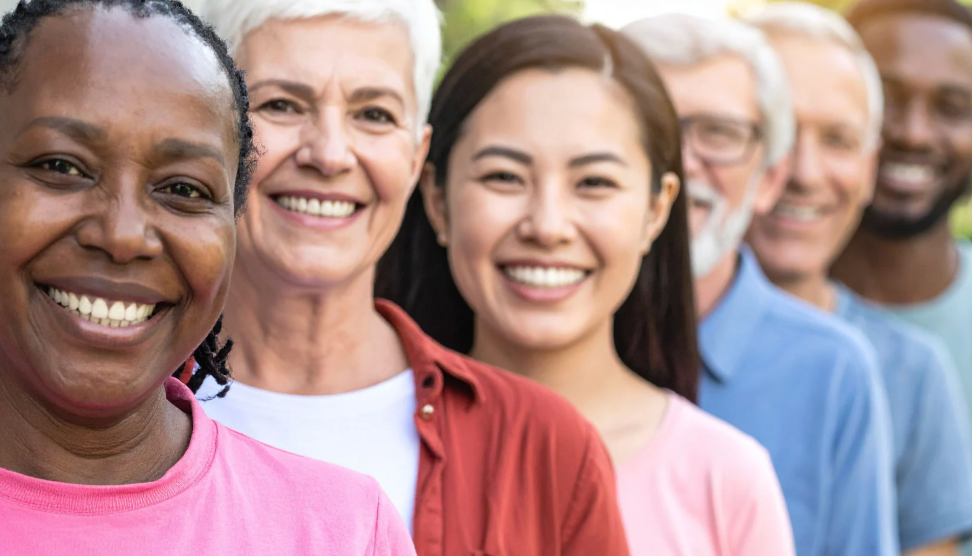 A view of a city with palm trees in the foreground