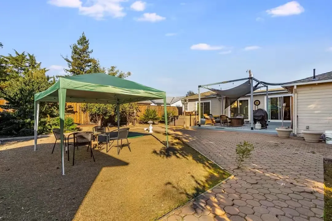 A laundry room with a washer and dryer in it.