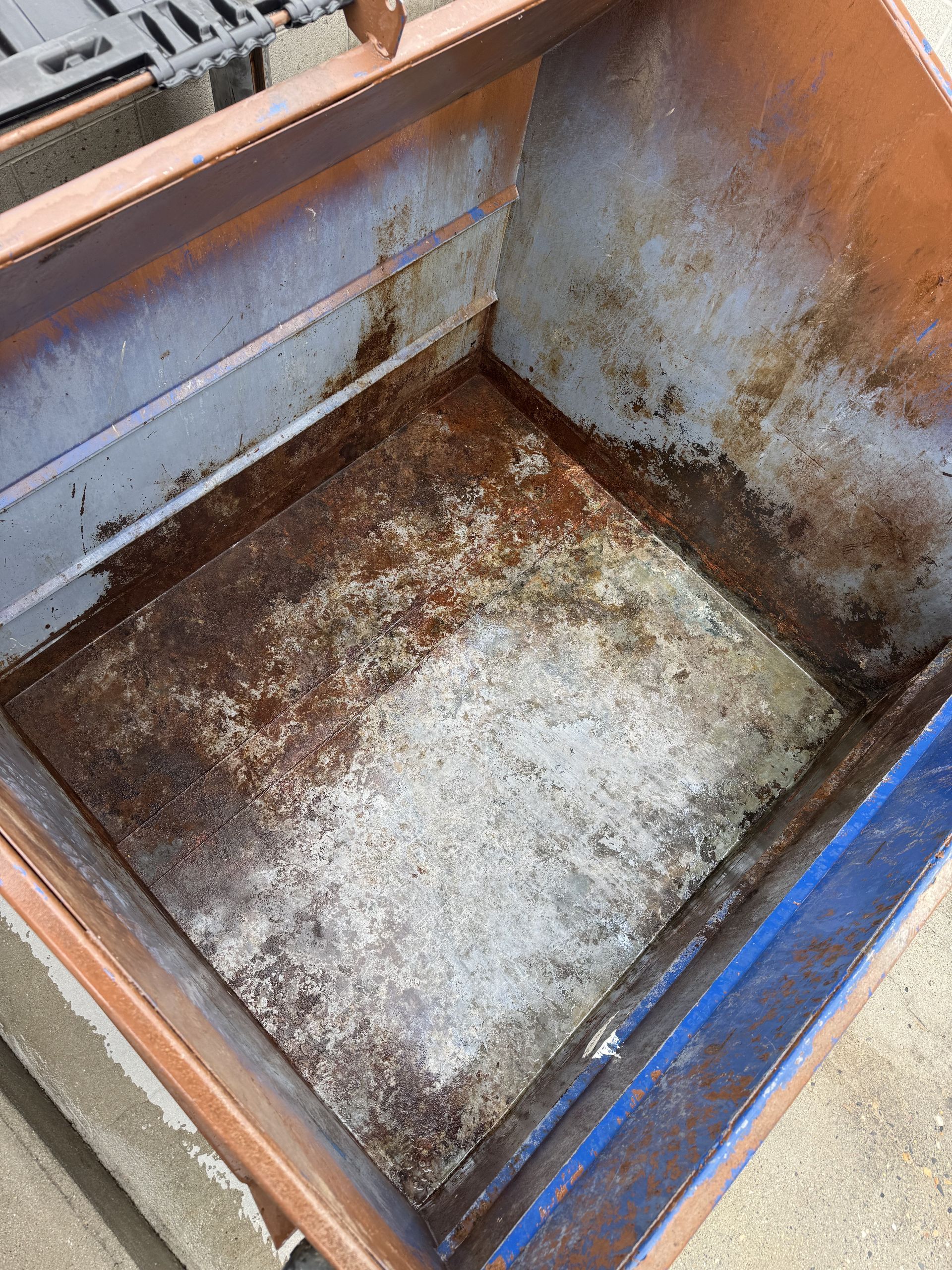 An after photo after the dumpster had been deep cleaned by Jet Dumpster & Exterior Cleaning