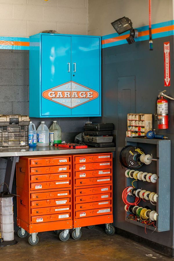 A garage with a blue cabinet and orange drawers. | The Garage in Renton