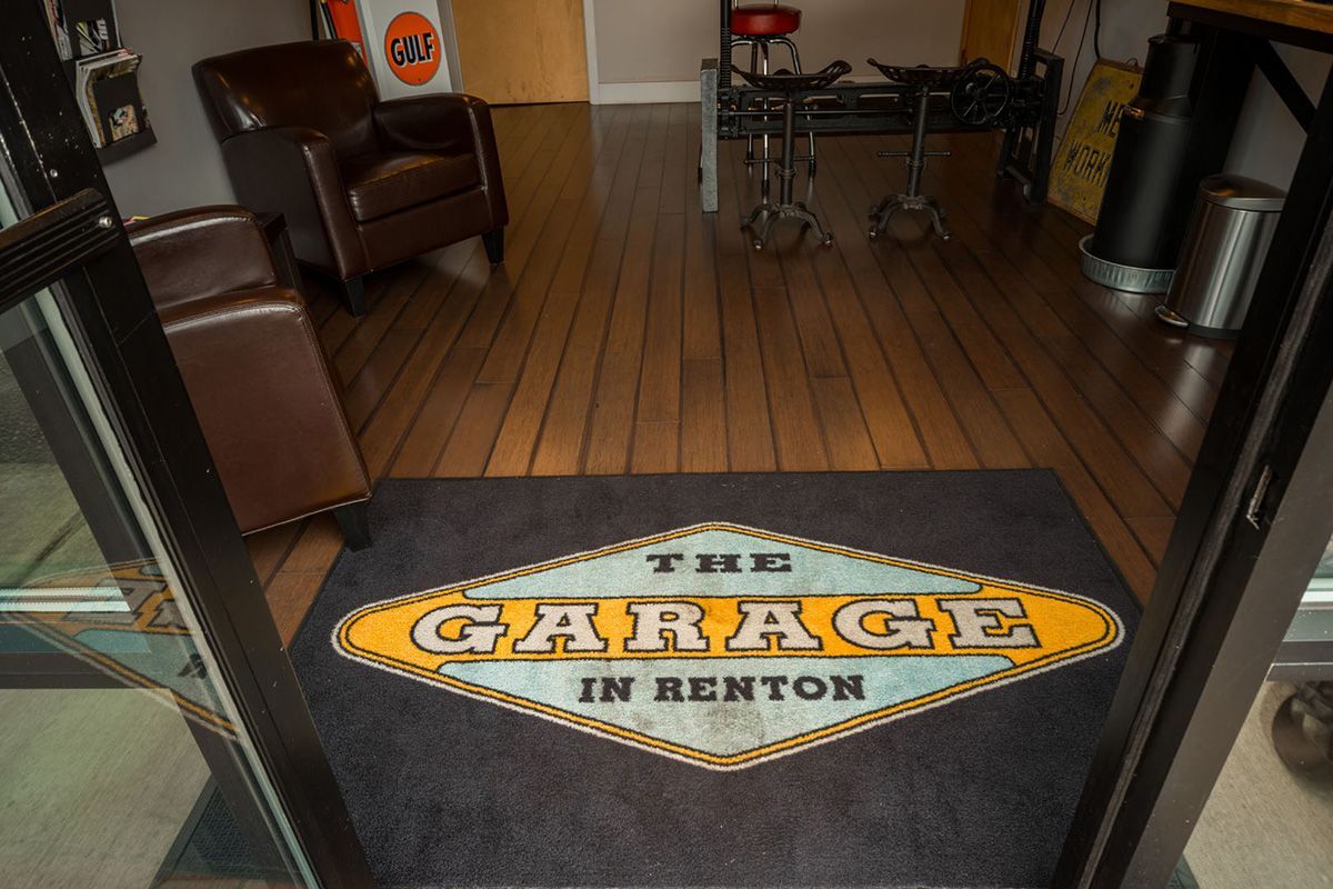 A door mat for the garage in benton is on the floor | The Garage in Renton