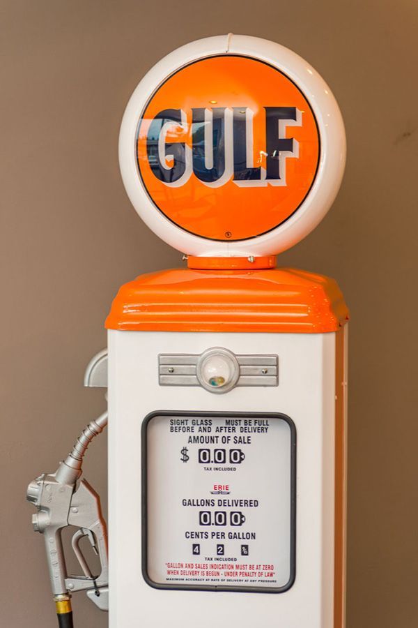 An orange and white gas pump with the word gulf on it | The Garage in Renton