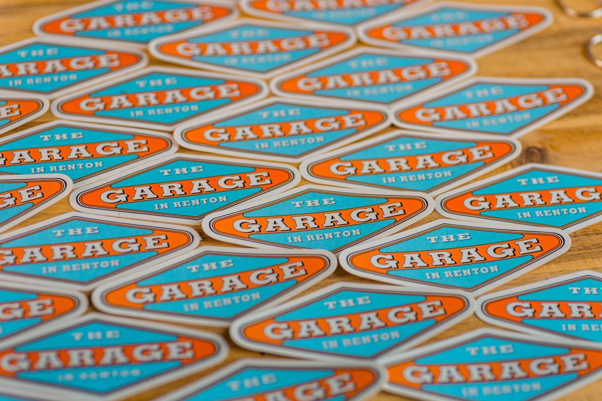 A bunch of stickers with the word garage on them | The Garage in Renton