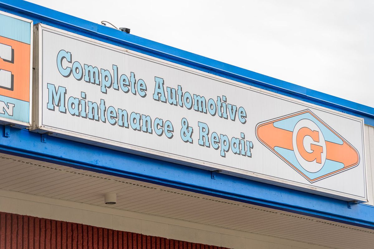 A sign for complete automotive maintenance and repair | The Garage in Renton