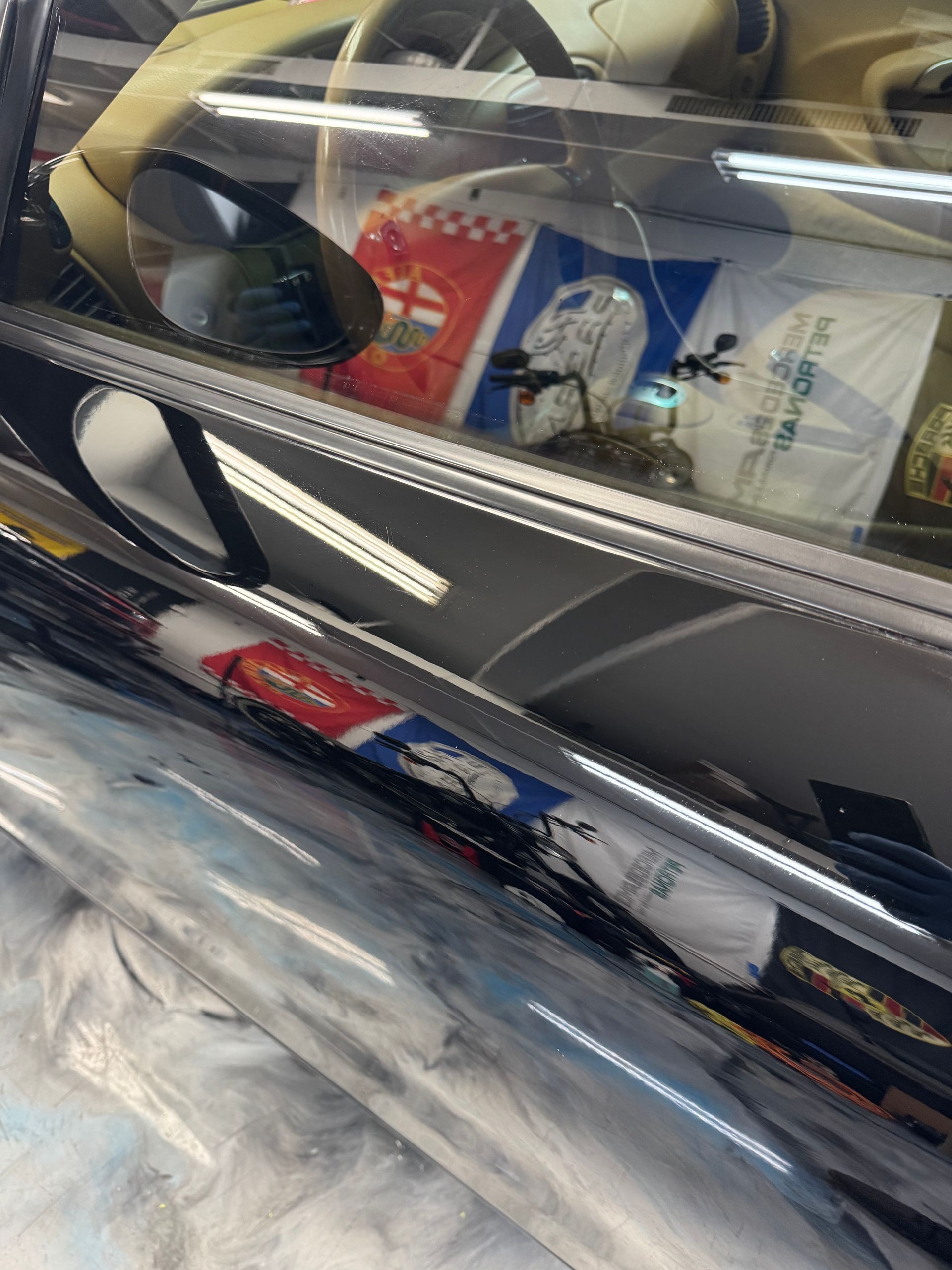 Porsche panel after correction — clear gloss finish