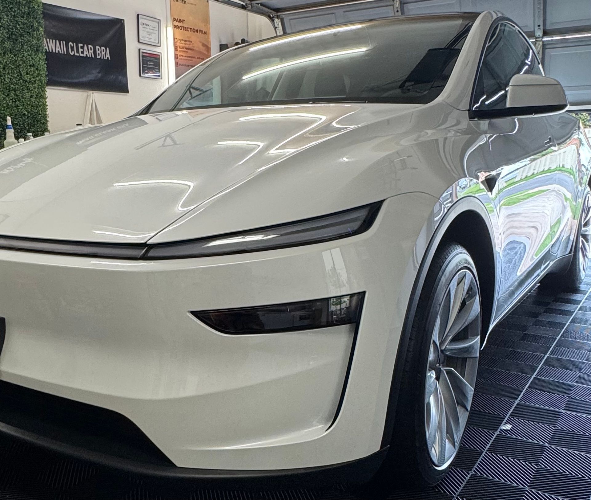 Ceramic coating Kapolei — Tesla Model Y white pearl at Standard Paint Protection west side studio