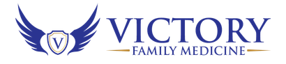 A logo for victory family medicine with a shield and wings.