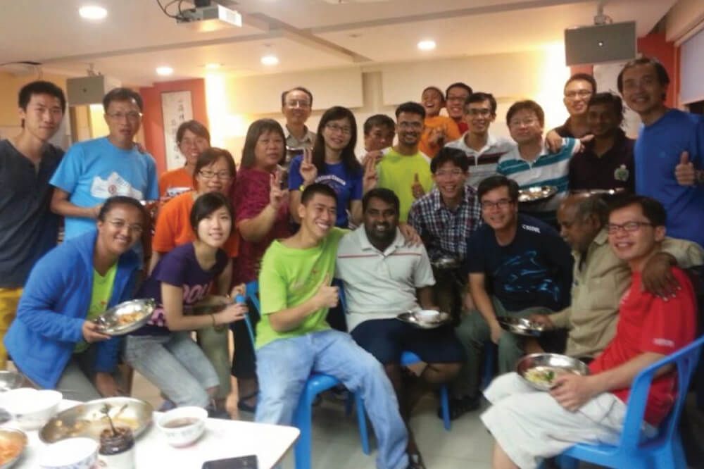 A large group of people are posing for a picture