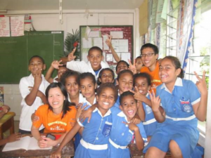 Hayley with A group of children are posing for a picture in a classroom