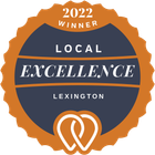 2022 Local Excellence award badge, Lexington. Navy and orange with linked heart graphic.
