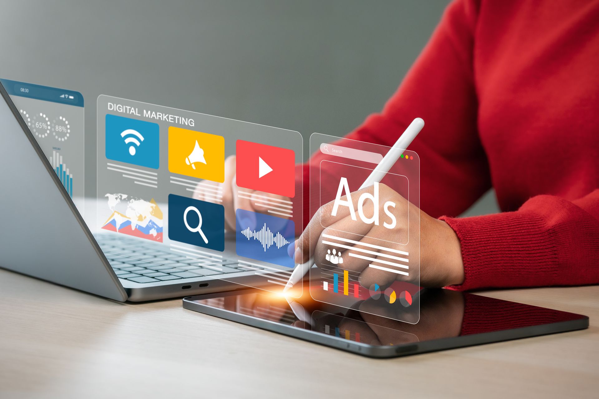 Person in a red shirt holding a smart pen, working on advertising their business on Google