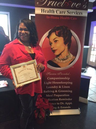 Happy Woman With Award — Nashville TN — Trueloves Health Care Services