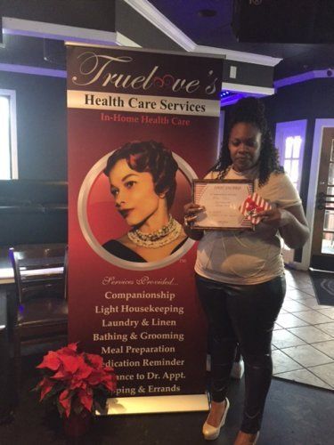 Woman With Award — Nashville TN — Trueloves Health Care Services