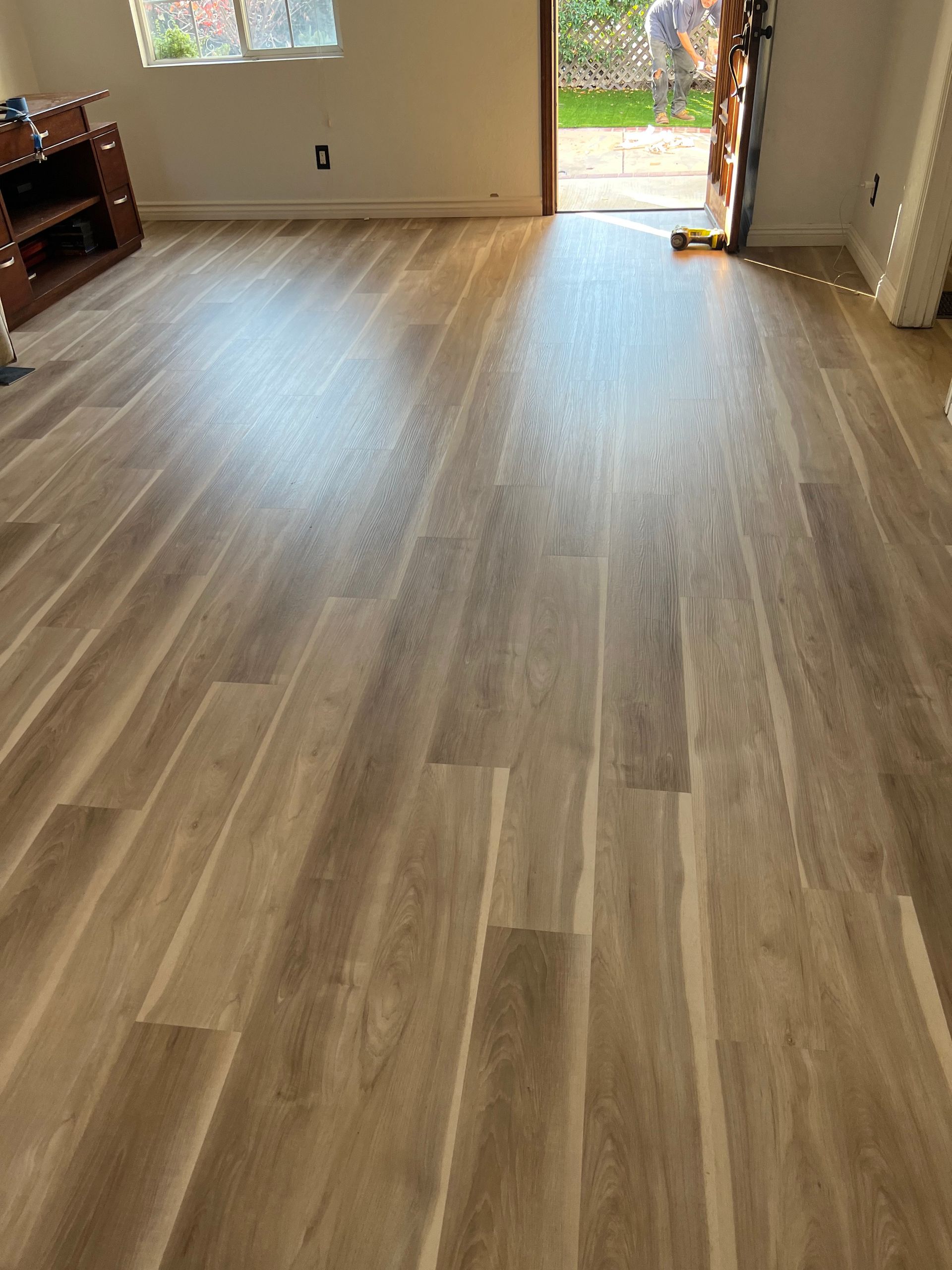 A wooden floor in a room